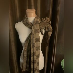 Authentic Louis Vuitton Scarf. Scarf has minor cosmetic issues as pictured.